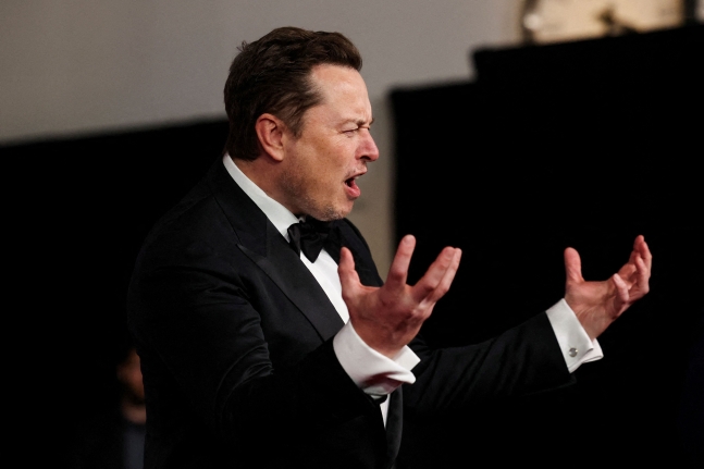 FILE PHOTO: Elon Musk attends the Breakthrough Prize awards in Los Angeles, California, U.S., April 13, 2024. REUTERS/Ma